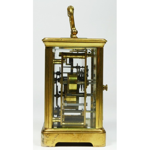 271 - A brass alarm carriage clock, the white enamel dial lacking minute and alarm hands, the movement str... 