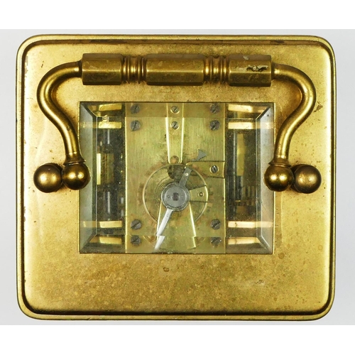 271 - A brass alarm carriage clock, the white enamel dial lacking minute and alarm hands, the movement str... 