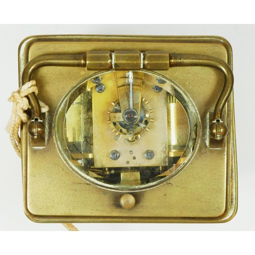 274 - T. Martin & Co., London & Paris, a late 19th century brass striking carriage clock, the white enamel... 