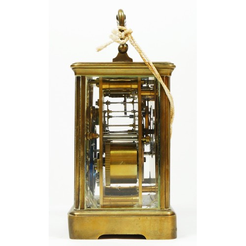 274 - T. Martin & Co., London & Paris, a late 19th century brass striking carriage clock, the white enamel... 