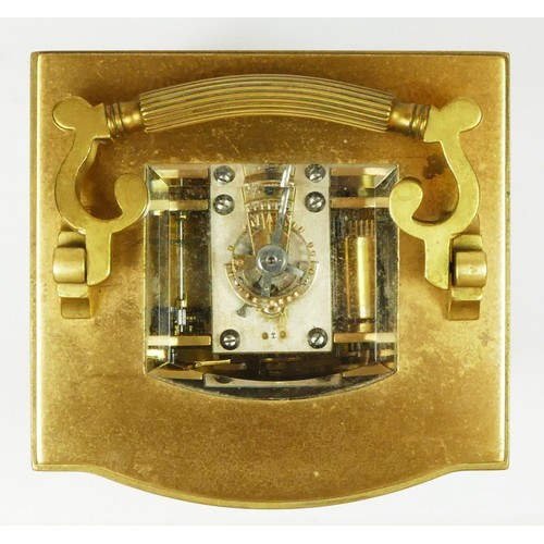 275 - A late 19th century French brass carriage clock, with bombe front panel, the unsigned movement strik... 