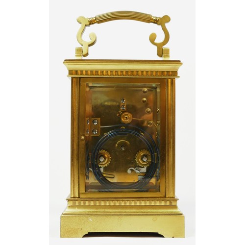 275 - A late 19th century French brass carriage clock, with bombe front panel, the unsigned movement strik... 