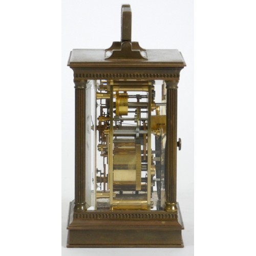 277 - Matthew Norman, London, a large brass cased alarm and striking carriage clock, the white enamel dial... 