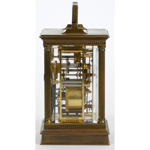 277 - Matthew Norman, London, a large brass cased alarm and striking carriage clock, the white enamel dial... 