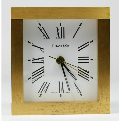 280 - Tiffany & Co., a heavy brass quartz alarm clock, with brushed finish, 9 x 8 x 3.5cm, lacking hand se... 