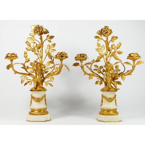 284 - Planchon, Paris, an impressive French late 19th century gilt brass and white marble clock garniture,... 