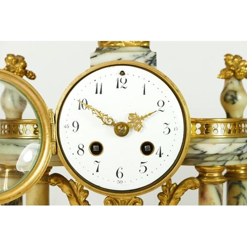 285 - S.H., Paris, a late 19th century French gilt metal and variegated marble clock garniture, the moveme... 