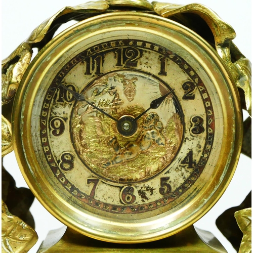 293 - The British United Clock Co. Ltd., an early 20th century brass desk time piece, the dial with a day ... 