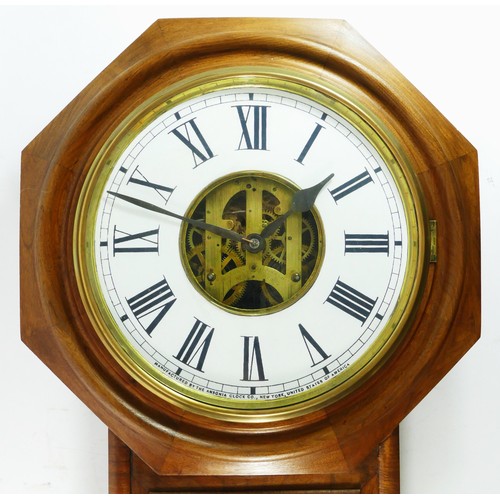 295 - Ansonia Clock Co., New York, an early 20th century oak cased wall clock, the 12