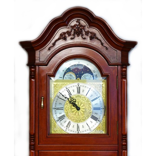 296 - A 20th century carved and pierced hardwood musical longcase clock, the silvered chapter ring with Ro... 