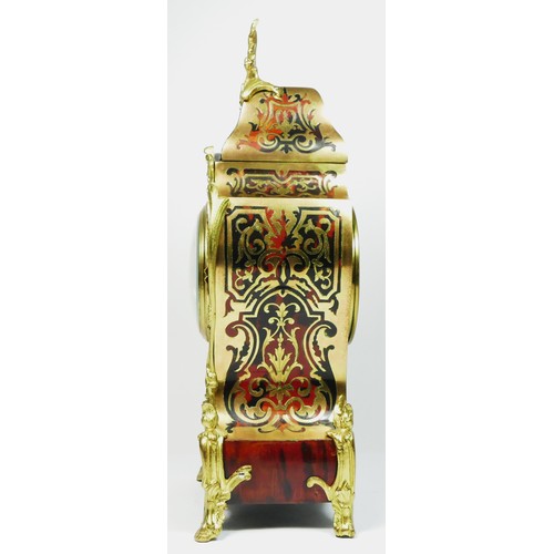 298 - An early 20th century French Boulle mantel clock, with cast brass mounts, the movement striking on a... 