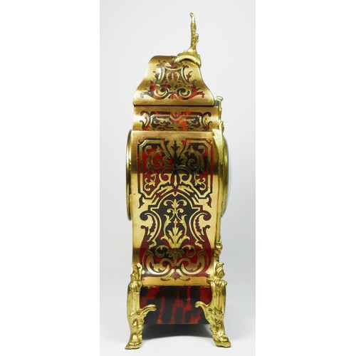 298 - An early 20th century French Boulle mantel clock, with cast brass mounts, the movement striking on a... 