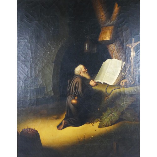 313 - After Gerrit Dou(1613-1675), a 19th century copy of a hermit in prayer, oil on canvas, 55 x 43cm.
Th... 