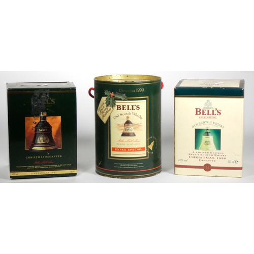 329 - Three Bells collectable decanters, of Festive interest, with contents, to include Christmas 1990 (bo... 