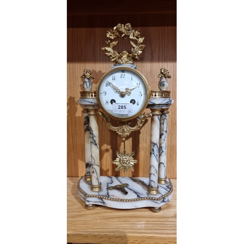 285 - S.H., Paris, a late 19th century French gilt metal and variegated marble clock garniture, the moveme... 