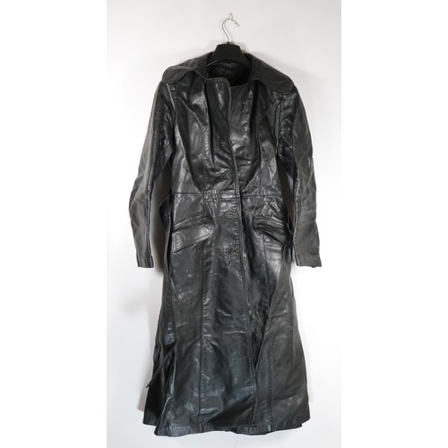 119 - A 1970's  full length black, button through, single vented belted leather coat purchased around 1977... 