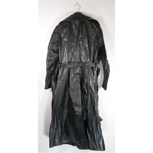 119 - A 1970's  full length black, button through, single vented belted leather coat purchased around 1977... 