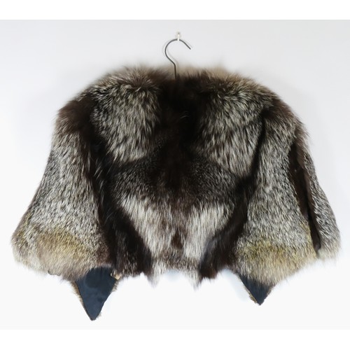 113 - A lined, brown fur cape, 44cm across shoulders, length 41cm