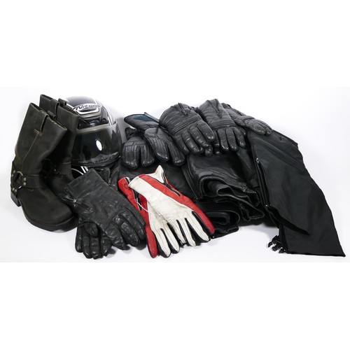 122 - Various motorcycle jackets, trousers, gloves, boots and a helmet to include 5 pairs of leather glove... 