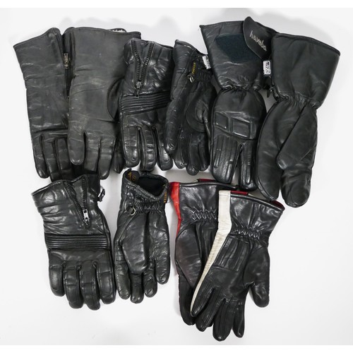 122 - Various motorcycle jackets, trousers, gloves, boots and a helmet to include 5 pairs of leather glove... 