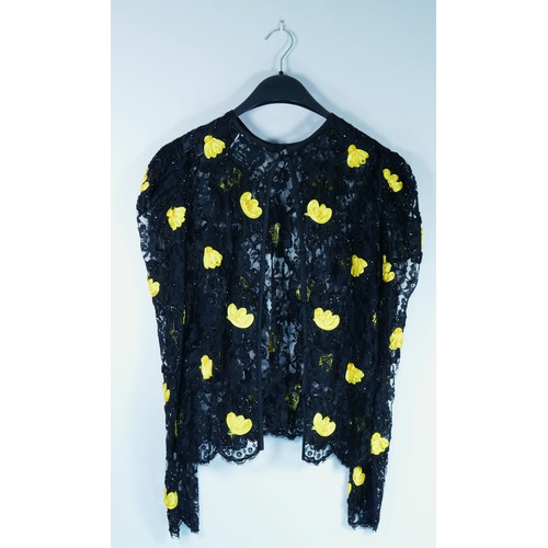 179 - A 'Hidy Misawa' black dress with lace overcoat which has yellow flower pattern. (Size 16)