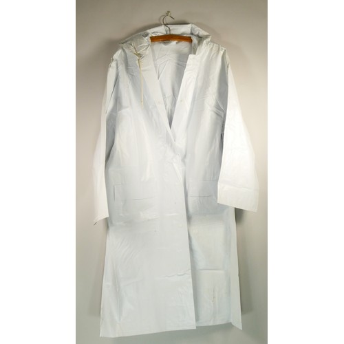 141 - A pair of raincoats including a white square patterned raincoat size 10 and a plain white 'Rainstar'... 