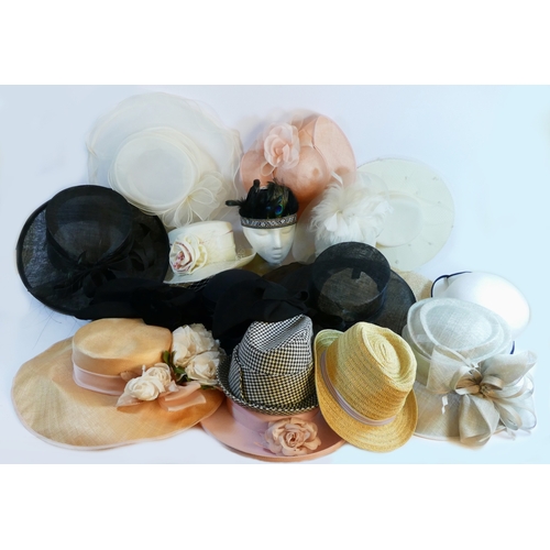 203 - A collection of vintage and modern hats, to include wedding or races brimmed hats, faux fur, two fas... 