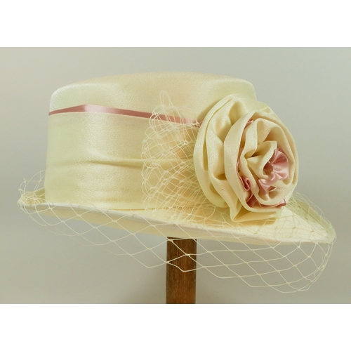 203 - A collection of vintage and modern hats, to include wedding or races brimmed hats, faux fur, two fas... 