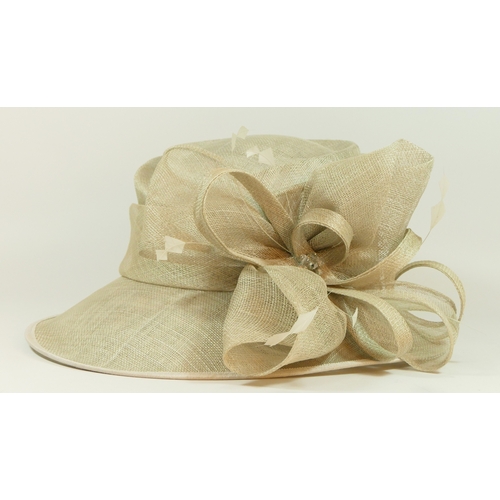 203 - A collection of vintage and modern hats, to include wedding or races brimmed hats, faux fur, two fas... 