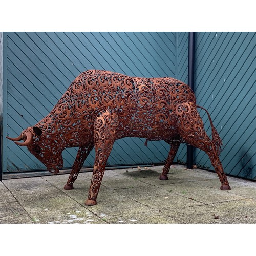 A contemporary pierced and welded steel Bull sculpture, 200 x 145 x 90cm