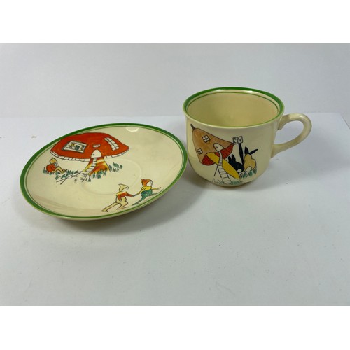 Clarice Cliff for Wilkinson Ltd, a 'Pixi' handle mug, the figural