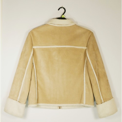 213 - Two sheepskin jackets, both 'Next', one a light green and zip up in size ladies 10 and the other bei... 