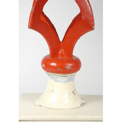 14 - A L.N.W.R. metal signal finial, mounted on a painted wooden base