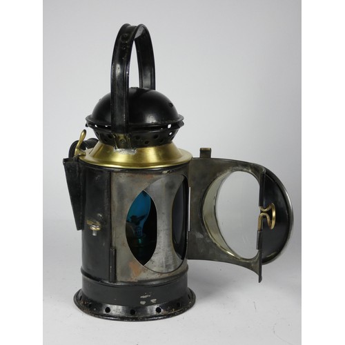 66 - A G.W.R. 4 aspect handlamp, cased stamped G.W.R T.E.Bladon & Son Ltd 1938, complete with burner