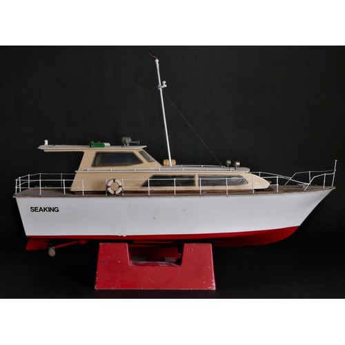 82 - Sea King, a radio controlled power boat with fibreglass hull and timber deck and superstructure, twi... 