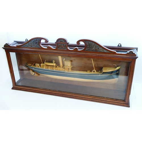 84 - An Edwardian wooden half block model of a Dutch coastal steamer, un-named, mahogany case with carved... 