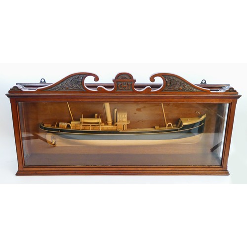 84 - An Edwardian wooden half block model of a Dutch coastal steamer, un-named, mahogany case with carved... 