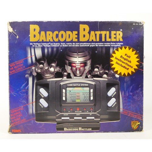 95 - Five Barcode Battler handheld game, by Tomy, to include a German import with English instructions, o... 