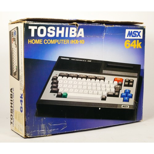 96 - A Toshiba MSX HX-10 64k home computer (serial No. 213989), AV cables, MSX BASIC reference manual and... 