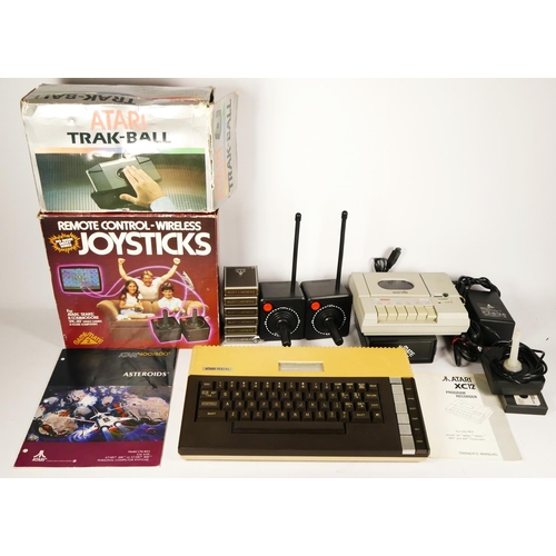 105 - An Atari 800XL computer, with AV and power cables, a joystick, Gamemate II controllers with Gamemate... 