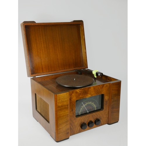 145 - A Seymour table top valve radio and gramophone, c.1939, 48cm x 34cm x 37cm