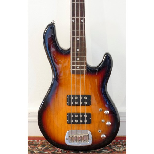 163 - A G & L Tribute Series L-2000 electric bass, poplar body with ash top, sunburst finish, including a ... 