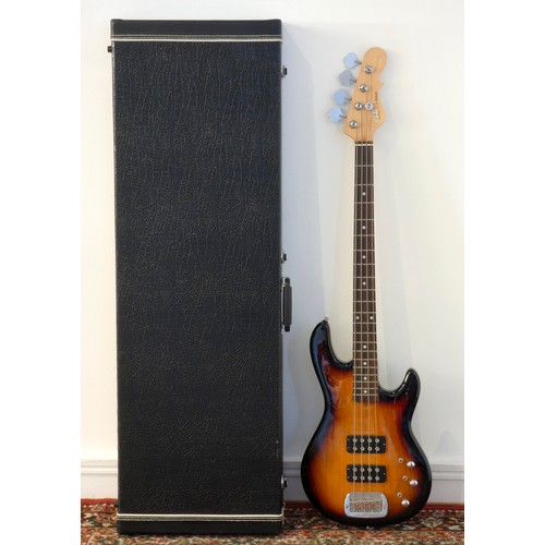 163 - A G & L Tribute Series L-2000 electric bass, poplar body with ash top, sunburst finish, including a ... 