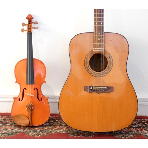 168 - A model KD 28 acoustic guitar, made in Italy (potentially a EKO KD28), together with a Skylark Brand... 