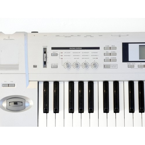 170 - A Korg Triton LE Music Workstation, together with manual and basic guide