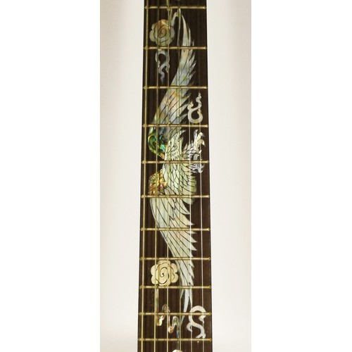 195 - An Antonio Tsai acoustic guitar, with mother of pearl inlay decoration, depicting a dragon (headstic... 