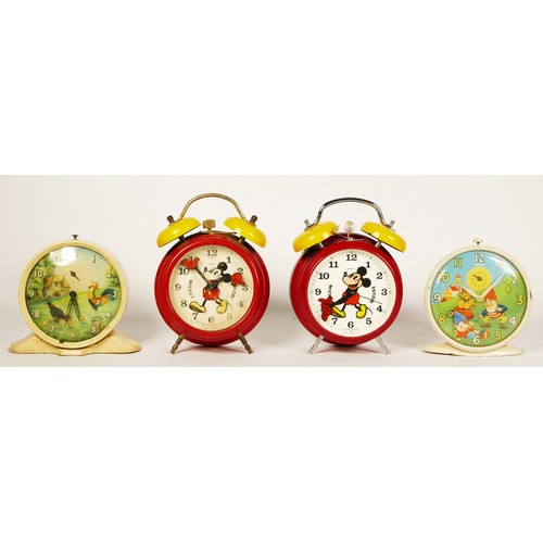 246 - Two Mickey Mouse alarm clocks, by Avronel, licensed by Disney, depicting Mickeys arms as the hands o... 