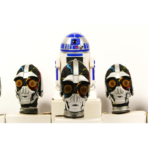 255 - Three R2-D2 alarm clocks, boxed with instructions, together with five C3PO electronic heads, boxed, ... 