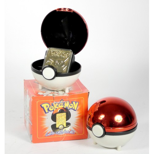 256 - A Pokeball, containing a 23k gold plated Pikachu card, in a plastic case with certificate of authent... 