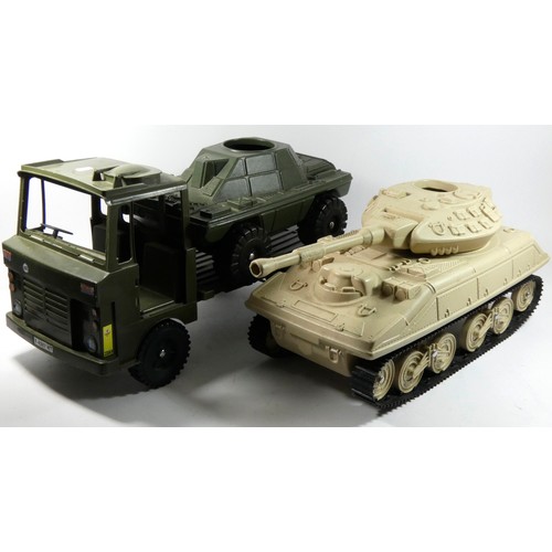 313 - Six Action Man vehicles, to include a tank, military jeep, military flatbed truck, sports car and ot... 